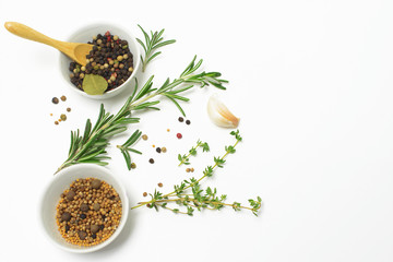 Herbs and spices on white background