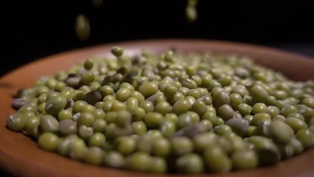 Slow motion. green beans lentils. Macro