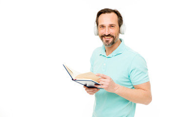 Online education. Man mature bearded guy listening online course. Get more information. Audio book. Reading and listening. Modern education concept. Benefits of online education. Access to knowledge