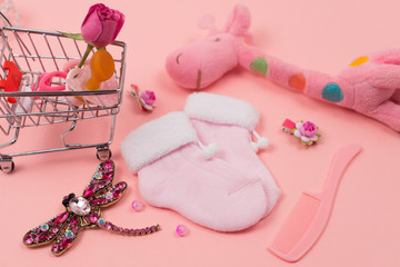  Children's things and accessories on a pink background. Baby concept