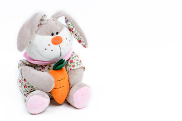 Soft toy hare on a white background
