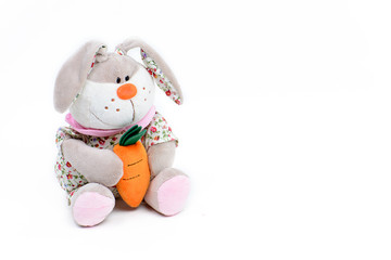 Soft toy hare on a white background