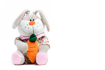Soft toy hare on a white background