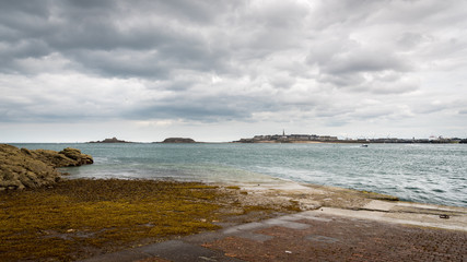 Beach of Dinard and old city of Saint-Malo in the background