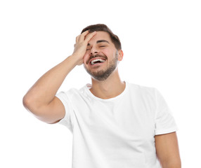 Portrait of young man on laughing white background