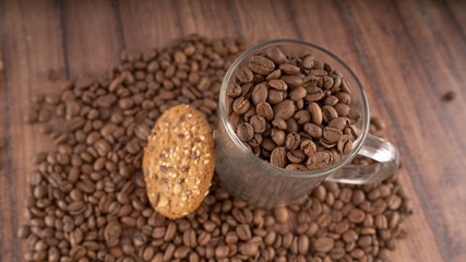 Oatmeal cookies and coffee beans. The concept of morning Breakfast