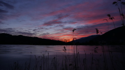 Iced lake at the sunset