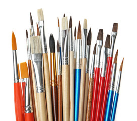 Set of different paint brushes on white background