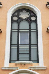 Fototapeta na wymiar Old Jewish church window , in Bistrita , Romania, 2016