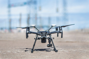 Drone landed and working for ortophoto and thermal analysis of PV Plants with visual and thermal camera. UAV are used for easy aerial inspections of Solar, Wind and Hydro renewable energy resources