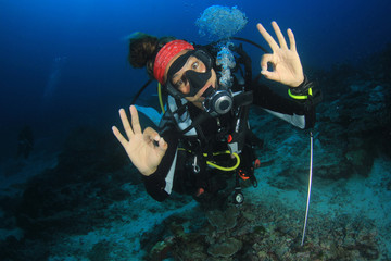 Young woman scuba diving 