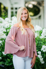 High School Senior Photo of Blonde Caucasian Girl Outdoors