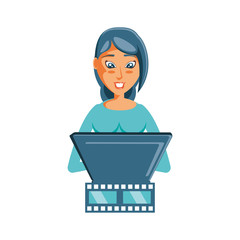 woman with video tape and laptop