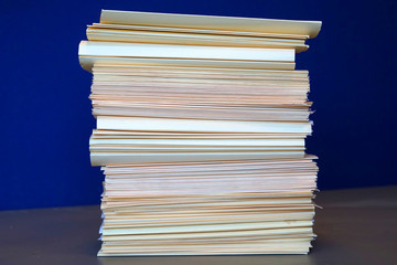 close up on the stacking documents and folders