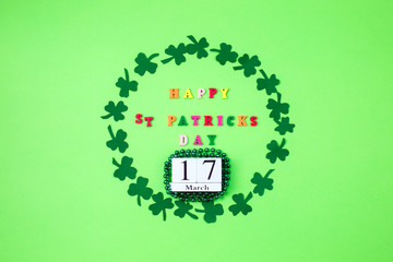Text happy St. PAtrick's Day and green clover ornament. Patric's postcard design.