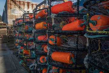 Crab  pots stacked along the bay waterfront in Newport Oregon