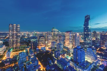 Fotobehang Modern building in Bangkok business district at Bangkok city with skyline at twilight, Thailand. © ake1150