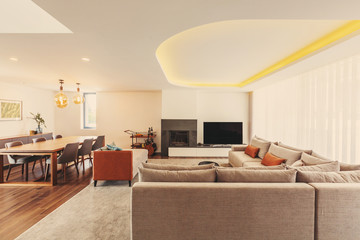 Living room modern interior design with grey colours, white walls