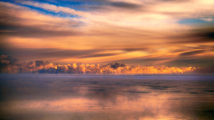 Dramatic sunset clouds over the sea