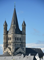 Fototapeta premium Great St. Martin Church and colorful houses in Cologne, Germany,2017