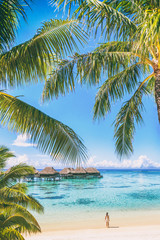 Tahiti luxuy travel resort overwater bungalow hotel in Bora Bora idyllic holiday woman in paradise...