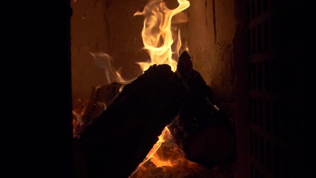 Firewood burning in tile stove - 180 fps slow motion