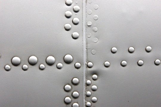 Shiny White Metal Airplane Macro Background With Rivets