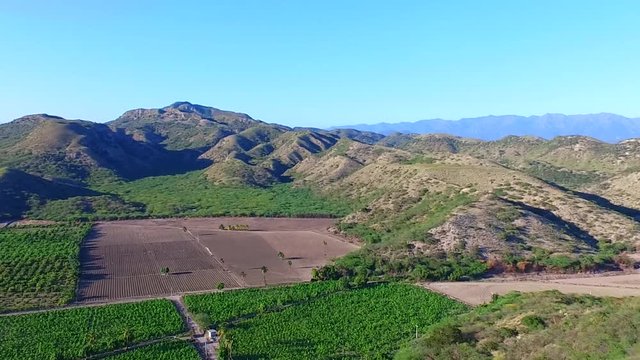 View of a harvest in between mountains