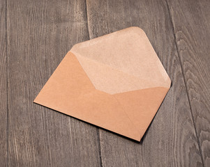 Envelope on a wooden background