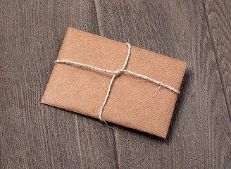 Envelope on a wooden background