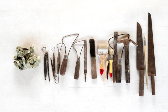 Sculpture tools set background. Art and craft tools on a white background.