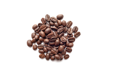Roasted coffee beans isolated on white background. Close-up.