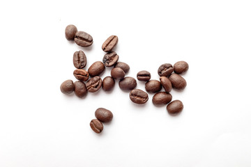 Coffee beans isolated on white background. Close-up.