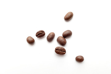 Coffee beans isolated on white background. Close-up.