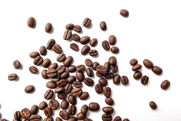 Roasted coffee beans isolated on white background. Close-up.