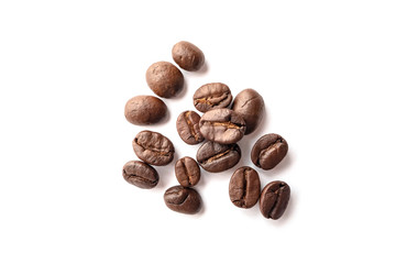 Roasted coffee beans isolated on white background. Close-up.