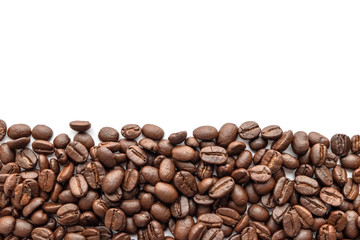 Roasted coffee beans on white background. Close-up.