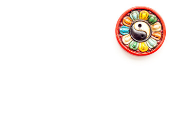 Buddhist symbol. Yin Yang symbol on white background top view space for text