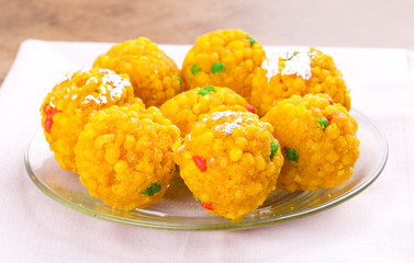 Laddu also know as laddoo, ladoo, laddo are ball-shaped sweets popular in the Indian festivals. Laddu are made of flour, minced dough and sugar with other ingredients.