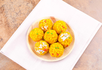 Laddu also know as laddoo, ladoo, laddo are ball-shaped sweets popular in the Indian festivals. Laddu are made of flour, minced dough and sugar with other ingredients.