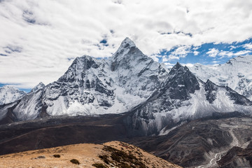 Beautiful view of Ama Dablam mountain summit on the famous Everest Base Camp trek in the Himalayas,...