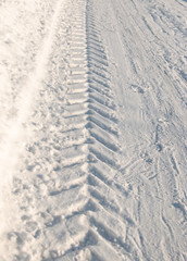 traces of engine wheels in the snow
