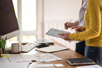 Web UI designers team drawing website UX planning application development for web mobile phone