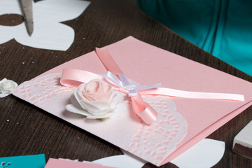 Making greeting cards from paper, cardboard and tape.