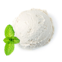 Vanilla ice cream ball with fresh mint leaf isolated on white background, macro