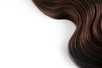 Lock of beautiful healthy brown hair