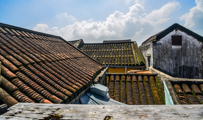 Roof top of old brick houses in Hoi An
