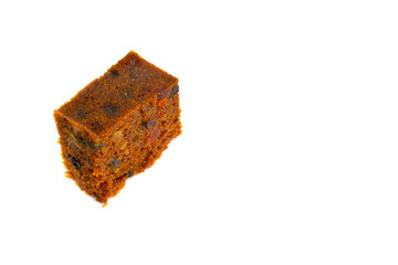 Fruitcake isolated on white background with selective focus