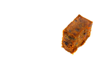 Fruitcake isolated on white background with selective focus