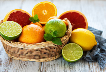 Fototapeta na wymiar Basket with citrus fresh fruits